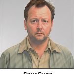 A watercolour picture of a 30 year old fat man with dark brown, wind-tousled hair, which is receding a little. He is wearing a beige shirt and a khaki jacket. He has sad brown eyes, and an anxious look on his face. He hasn't shaved for a week and generally looks clueless. The image is labelled SpudGunn