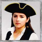 A watercolour painting of a pretty 18 year old young lady. She has long straight black hair, part of which is brought forward into a ponytail held in place with a gold hair band. She is wearing a tricorn hat and has small silver stud ear rings. A gentle face has a hint of a smile. She also has a royal blue waistcoat over a frilly white blouse with an upturned collar. She looks thoughtful and wise. The image is labelled Slender.