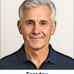A watercolour picture of a kind, mature man in his sixties. He has an abundant smile, lovely chestnut brown eyes, and traces of a few wrinkles. His grey hair is short and well groomed. He is wearing a navy blue polo shirt. The background is a plain grey wall, and the image is labelled Faraday. Michael Scott is nicknamed Faraday because he's an electrical and mechanical engineer.