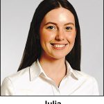 A water colour painting of a waitress aged 22 years old, looking happy and cheerful. She has long dark chocolate brown hair, and deep chestnut brown eyes. A gorgeous smile and perfect white teeth. She is wearing a smart, clean white blouse, and she has no jewellery. The image is labelled Julia Concordia.