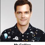 A watercolour painting of a male science teacher who is 35 years old and has a passion for the solar system. He has short brown hair and hazel eyes, and a gentle smile. At the annual pyjama party at the orphanage he appears on stage wearing his outer space pyjamas, the ones with bright planets and stars and a milky way set onto a dark cobalt blue background. Out of shot he also has his teddy bear who's wearing flying goggles. The image is labelled Mr Collins.