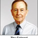 A watercolour painting of a 70 something man. He has short neat fair hair, and proud chestnut coloured eyes. His forehead and face have no wrinkles, but his jaw and his chin, and the mild folds of skin on his neck reveal that he’s quite old. He has a neutral expression as if posing for a regimental portrait. He is wearing a pale blue dress shirt and his cricket club tie, which has bold stripes of Royal blue, dark blue and silver. The image is labelled “The Colonel”.